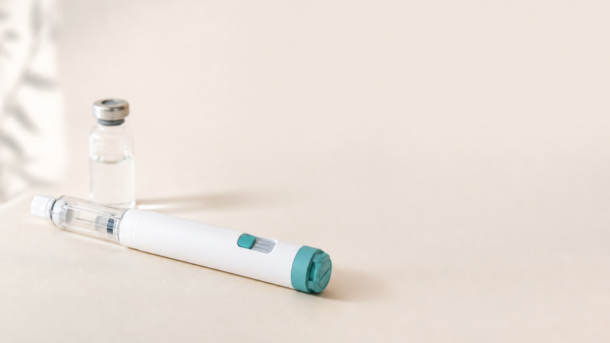 Unbranded [pillar-drug-class] injection pen on a neutral background — WeightLossInjections.com editorial hero