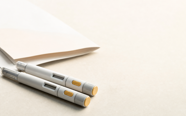 Unbranded [pillar-drug-class] injection pen on a neutral background — WeightLossInjections.com editorial hero