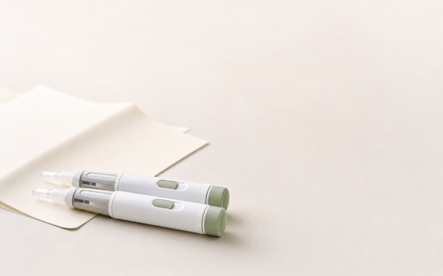Unbranded [pillar-drug-class] injection pen on a neutral background — WeightLossInjections.com editorial hero